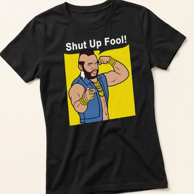 Cartoon Mr. T with the phrase 'Shut Up Fool!' in bright colors — printed on a women's shirt