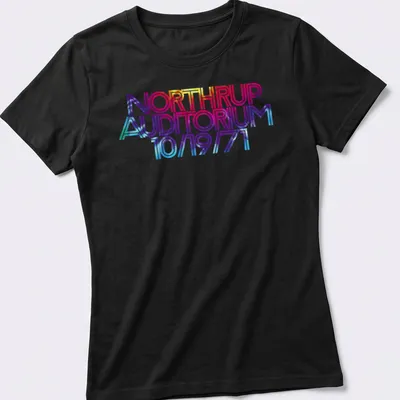 Bold retro t-shirt featuring NORTHRUP Auditorium concert details in vibrant colors — printed on a women's shirt