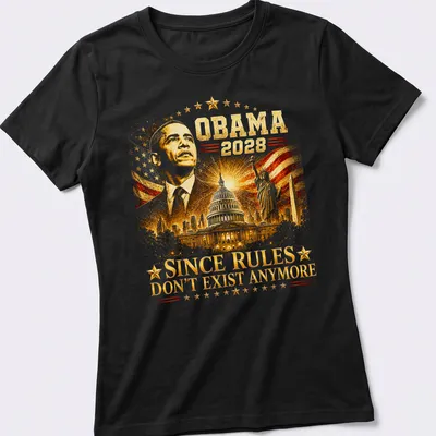 Satirical T-shirt featuring Obama 2028 text in red, white, blue and gold — printed on a women's shirt