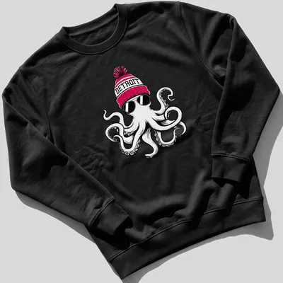 Bold cartoon octopus in a Detroit beanie on a — printed on a unisex sweatshirt
