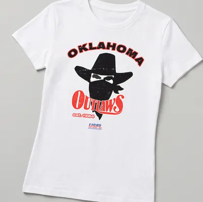 Retro distressed print featuring a cowboy with a hat and bandana above Oklahoma Outlaws text — printed on a women's shirt