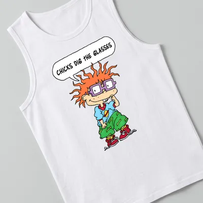 Cartoon boy with orange hair and purple glasses, text reads 'CHICKS DIG THE GLASSES' — printed on a tank top