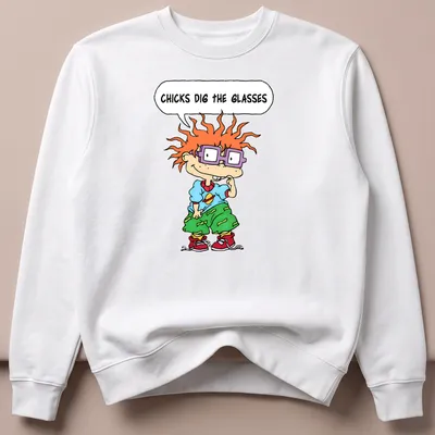Cartoon boy with orange hair and purple glasses, text reads 'CHICKS DIG THE GLASSES' — printed on a unisex sweatshirt