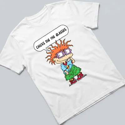 Cartoon boy with orange hair and purple glasses, text reads 'CHICKS DIG THE GLASSES'