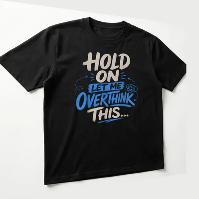 Bold text design featuring the phrase 'Hold On Let Me Overthink This' in blue and cream. — printed on a unisex t-shirt (angled view)