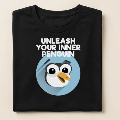 Cartoon penguin with motivational text 'You Can Do It' in light blue and black — printed on a women's shirt