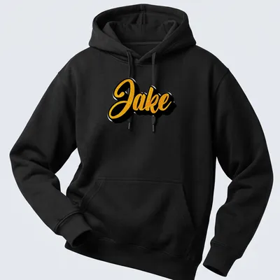 Bold cursive print of the name Jake in gold on a black — printed on a unisex hoodie