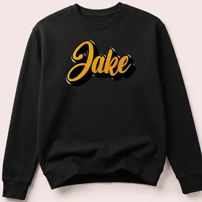 Bold cursive print of the name Jake in gold on a black — printed on a unisex sweatshirt