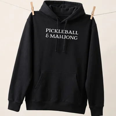 Bold lettering t-shirt featuring Pickleball and Mahjong graphics — printed on a unisex hoodie
