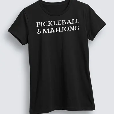 Bold lettering t-shirt featuring Pickleball and Mahjong graphics — printed on a women's shirt
