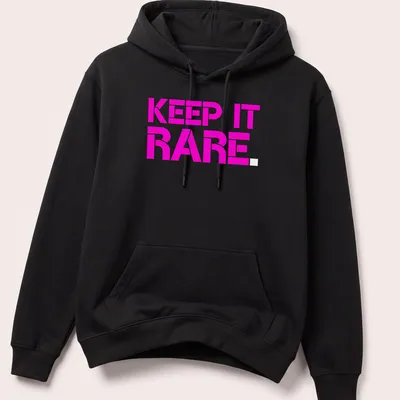 Bold graphic t-shirt featuring the text Keep It Rare in pink — printed on a unisex hoodie