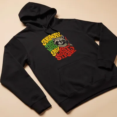 Colorful illustration of a raccoon with humorous text about frustration — printed on a unisex hoodie