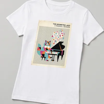 Ragdoll cat playing piano with colorful geometric shapes in the background — printed on a women's shirt