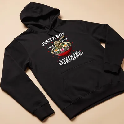 Colorful cartoon ramen bowl and video games T-shirt with playful text — printed on a unisex hoodie