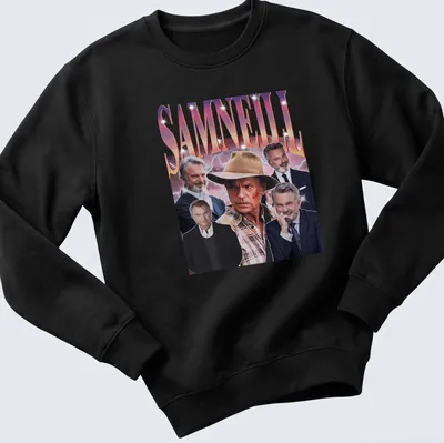Retro vintage Sam Neill t-shirt in purple, pink, white, and black — printed on a unisex sweatshirt