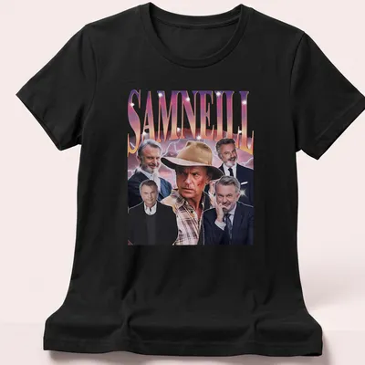 Retro vintage Sam Neill t-shirt in purple, pink, white, and black — printed on a women's shirt