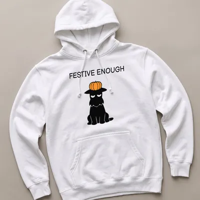 Cartoon Scottie dog wearing a pumpkin hat with the text 'Festive Enough' — printed on a unisex hoodie