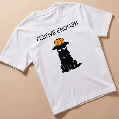 Cartoon Scottie dog wearing a pumpkin hat with the text 'Festive Enough'