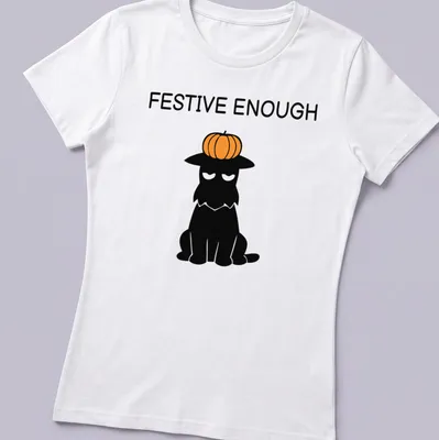 Cartoon Scottie dog wearing a pumpkin hat with the text 'Festive Enough' — printed on a women's shirt