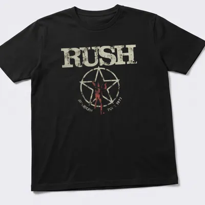 Vintage distressed t-shirt featuring silhouette figure and Rush American Tour 1977 text