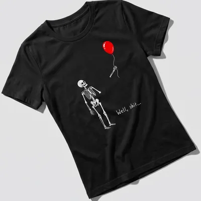 A cartoon skeleton holds a red balloon with the phrase 'Well, shit...' — printed on a women's shirt