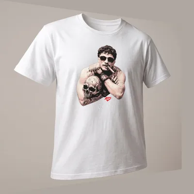 Vintage illustration of a muscular man with a skull, featuring the text 'Quillan Salkilld The Smoker' — printed on a unisex t-shirt (angled view)