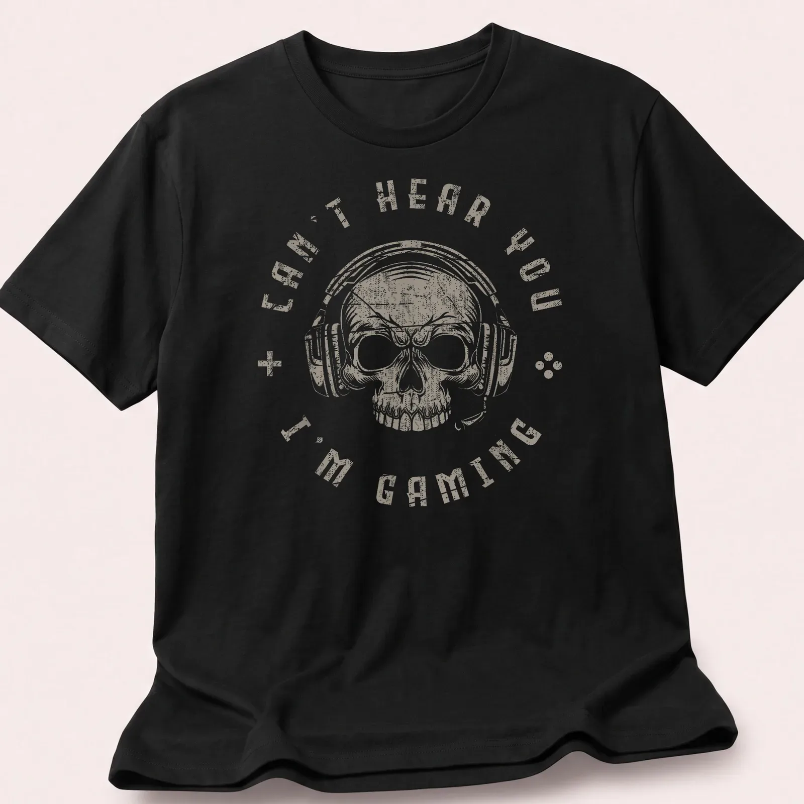 Distressed vintage gaming t-shirt featuring a skull with a headset and the text 'Can't Hear You I'm Gaming' — printed on a unisex t-shirt