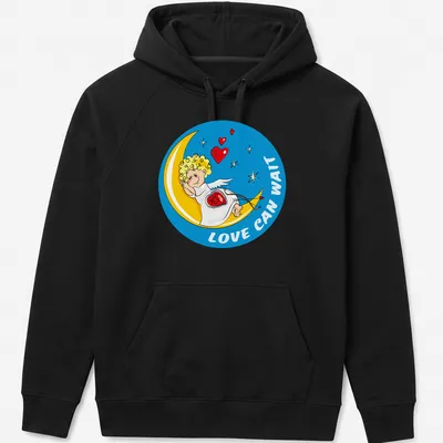 Cartoon of a sleeping Cupid on the moon with text Love Can Wait. — printed on a unisex hoodie