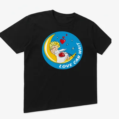 Cartoon of a sleeping Cupid on the moon with text Love Can Wait. — printed on a unisex t-shirt (angled view)