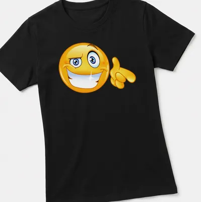 Cartoon-style smile emoji in bright yellow, blue, and white on a — printed on a women's shirt