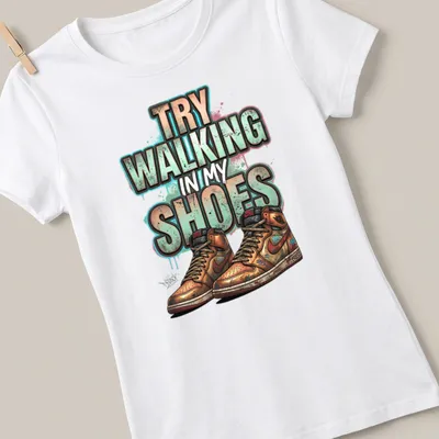 Graffiti style t-shirt featuring sneakers with the text 'Try Walking In My Shoes' — printed on a women's shirt
