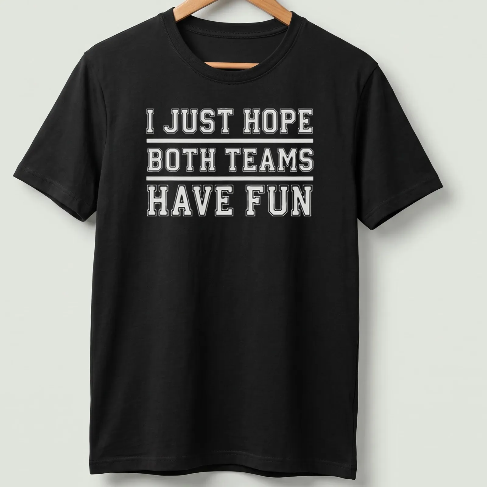 Bold text reading 'I JUST HOPE BOTH TEAMS HAVE FUN' on a sports fan — printed on a unisex t-shirt