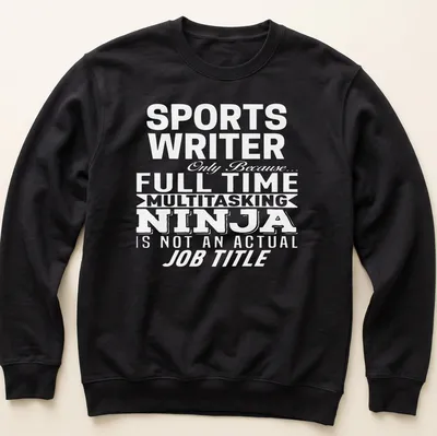 Illustration of a sports writer engaged in writing with a notebook and pen. — printed on a unisex sweatshirt