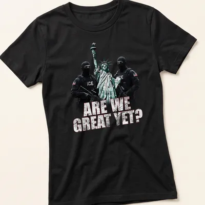 Grunge print of Statue of Liberty with ICE agents surrounding bold text — printed on a women's shirt