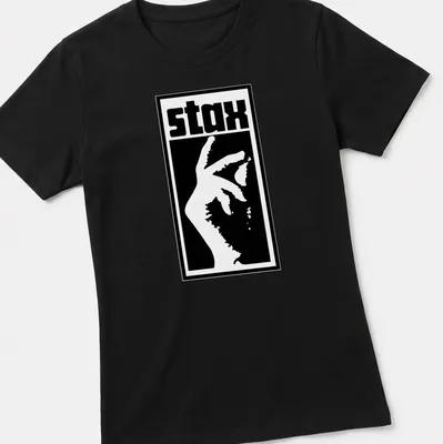 Bold graphic of the word 'stax' with a hand gesture in black and white. — printed on a women's shirt