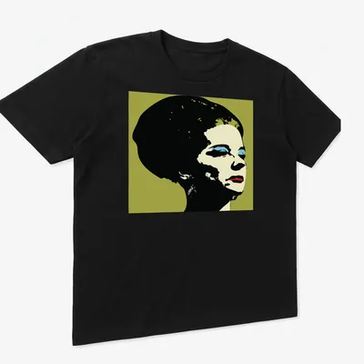 Pop art portrait of Liz Collins in bold colors including black, cream, blue, green, and red. — printed on a unisex t-shirt (angled view)