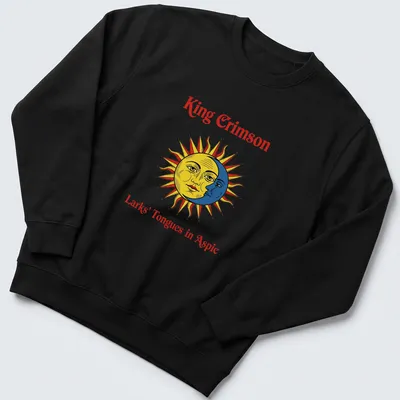 Vintage style t-shirt featuring a sun face and the text King Crimson Larks' Tongues in Aspic — printed on a unisex sweatshirt