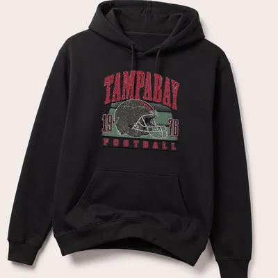 Retro distressed Tampa Bay football helmet t-shirt with bold lettering — printed on a unisex hoodie