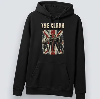 Distressed vintage t-shirt featuring The Clash band members in silhouette with bold text. — printed on a unisex hoodie