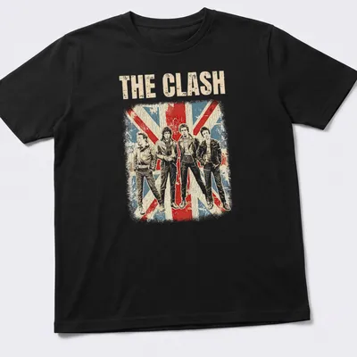 Distressed vintage t-shirt featuring The Clash band members in silhouette with bold text.