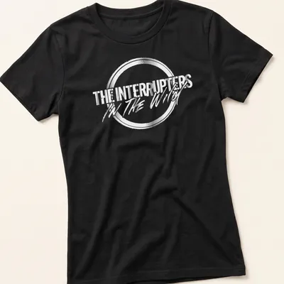 Metallic lettering of The Interrupters In The Wild shirt in silver and black — printed on a women's shirt