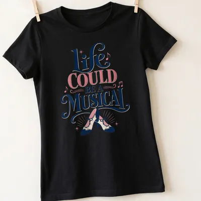 Vintage typography shirt featuring high-heeled shoes and musical quote — printed on a women's shirt