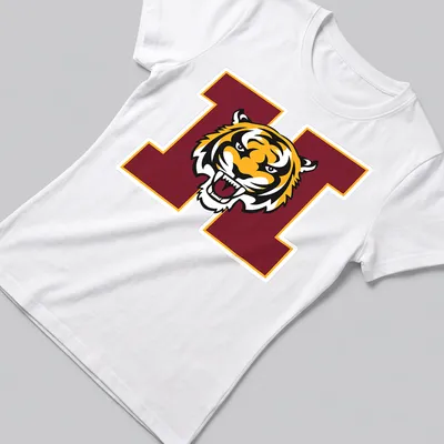 Bold graphic of a tiger mascot in orange, black, and maroon for Harrisburg High School — printed on a women's shirt
