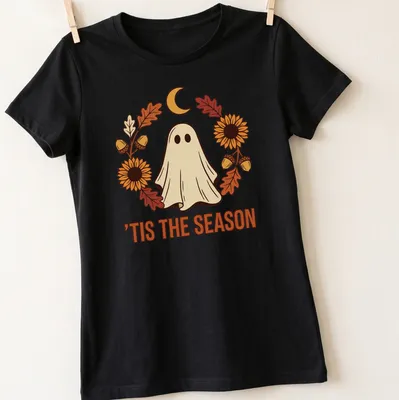 Illustrative T-shirt with a cute ghost and sunflower wreath in warm colors — printed on a women's shirt