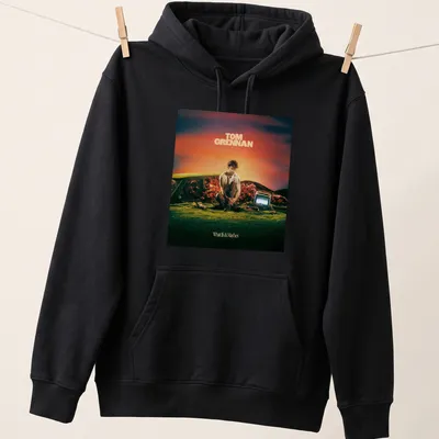 Vibrant surreal Tom Grennan t-shirt with colorful text and design — printed on a unisex hoodie