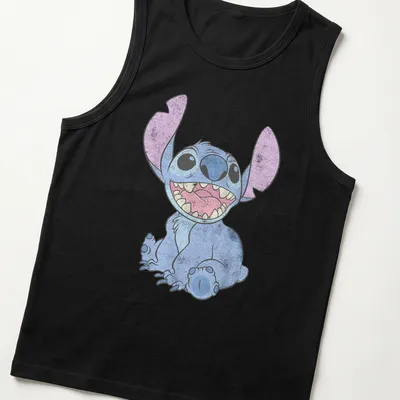 Cartoon of a happy alien character in bright colors against a tropical background — printed on a tank top