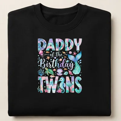 Colorful watercolor shirt featuring a mermaid and sea creatures with 'Daddy of the Birthday Twins' text — printed on a unisex sweatshirt