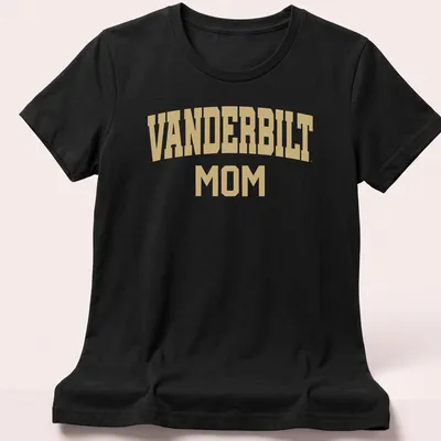 Gold VANDERBILT MOM text on white background in collegiate style — printed on a women's shirt
