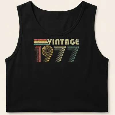Distressed T-shirt with 'VINTAGE 1977' text in red, green, yellow, and cream colors — printed on a tank top