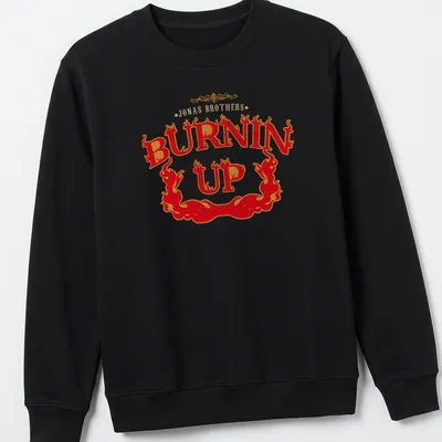 Bold retro print featuring flames and 'Jonas Brothers Burnin Up' text — printed on a unisex sweatshirt
